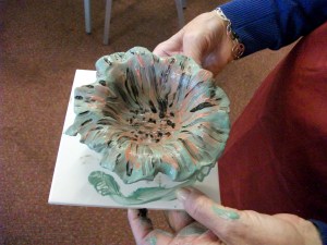 holding pot like flower