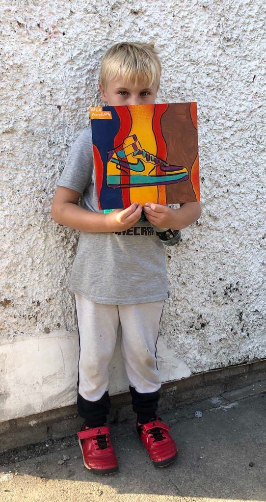 spray painted graffiti cards with stenciled hightops and shell toe designs